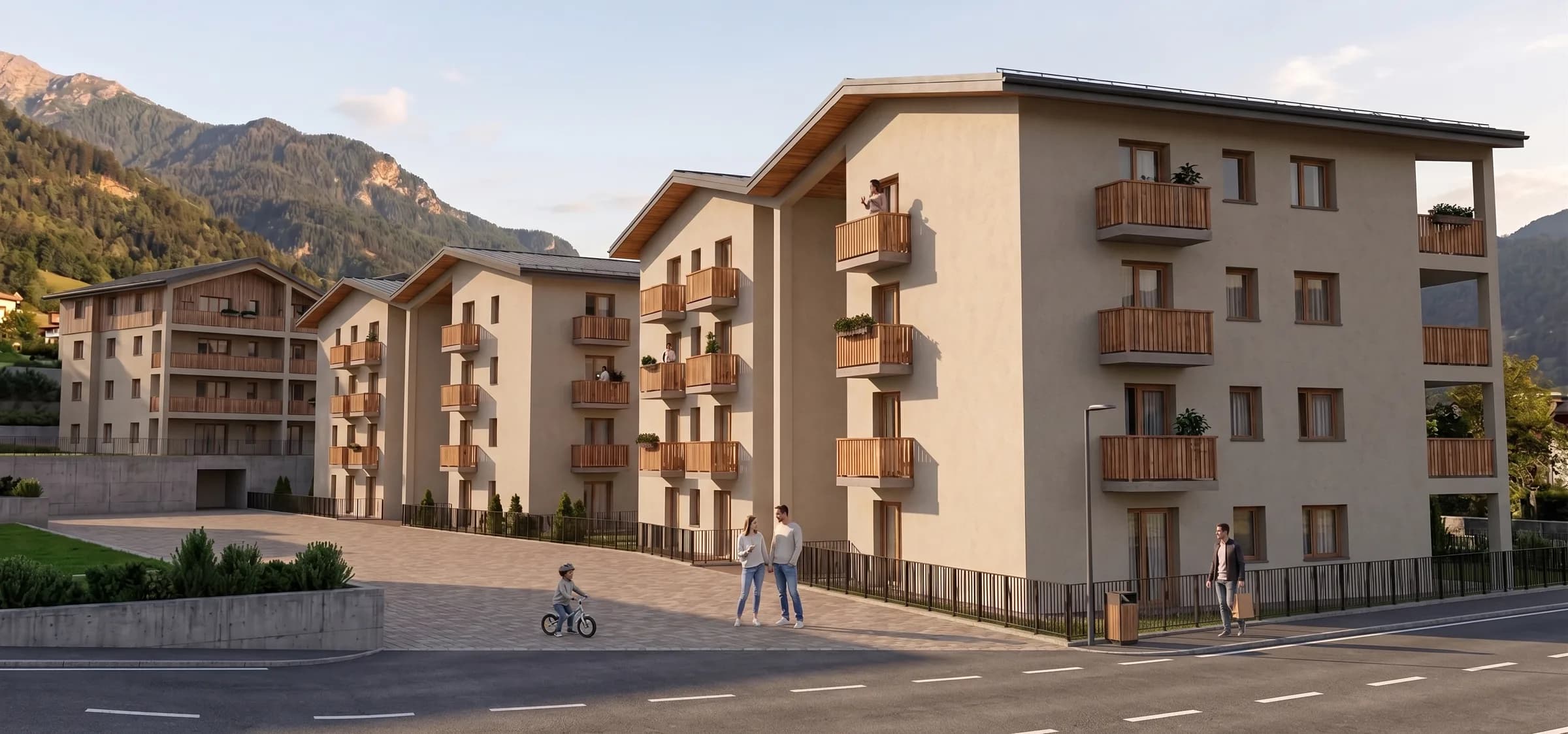 Wohnanlage Rizzi in Astfeld, Straßenansicht der geplanten Baukörper mit Lärchenholz-Balkonen im Abendlicht