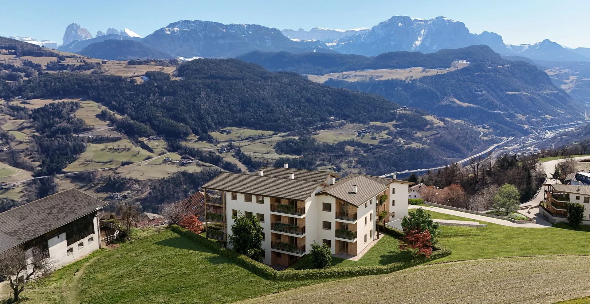 Wohnanlage Stöfl in Villanders in Panoramalage, im Hintergrund die Dolomiten